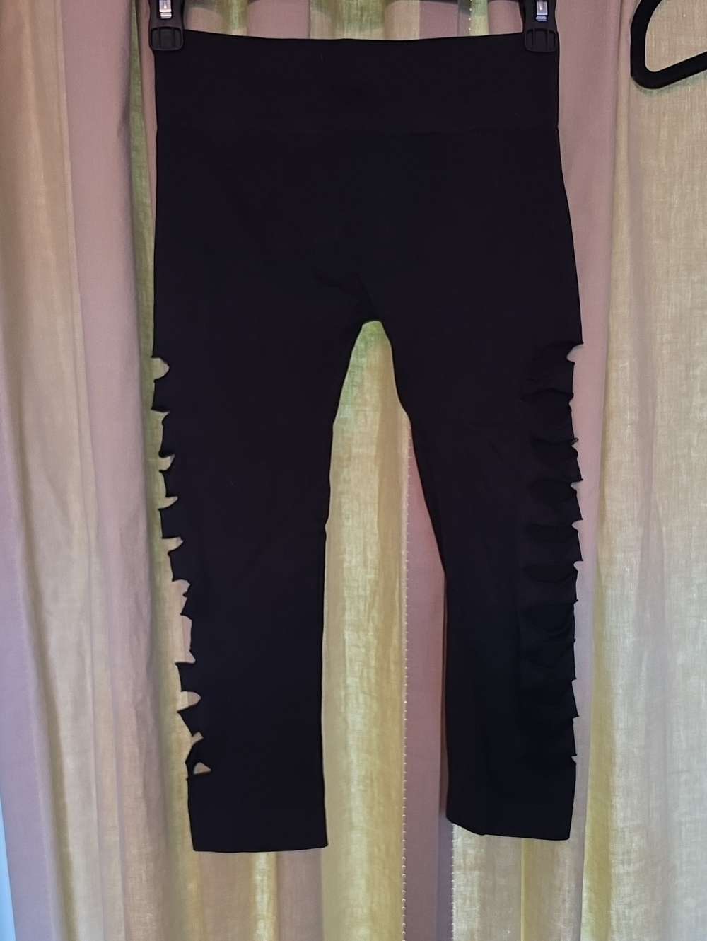 Nikibiki Black Capri Leggings with Side Ruffle Cutouts